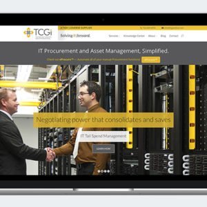 TCGi website on laptop