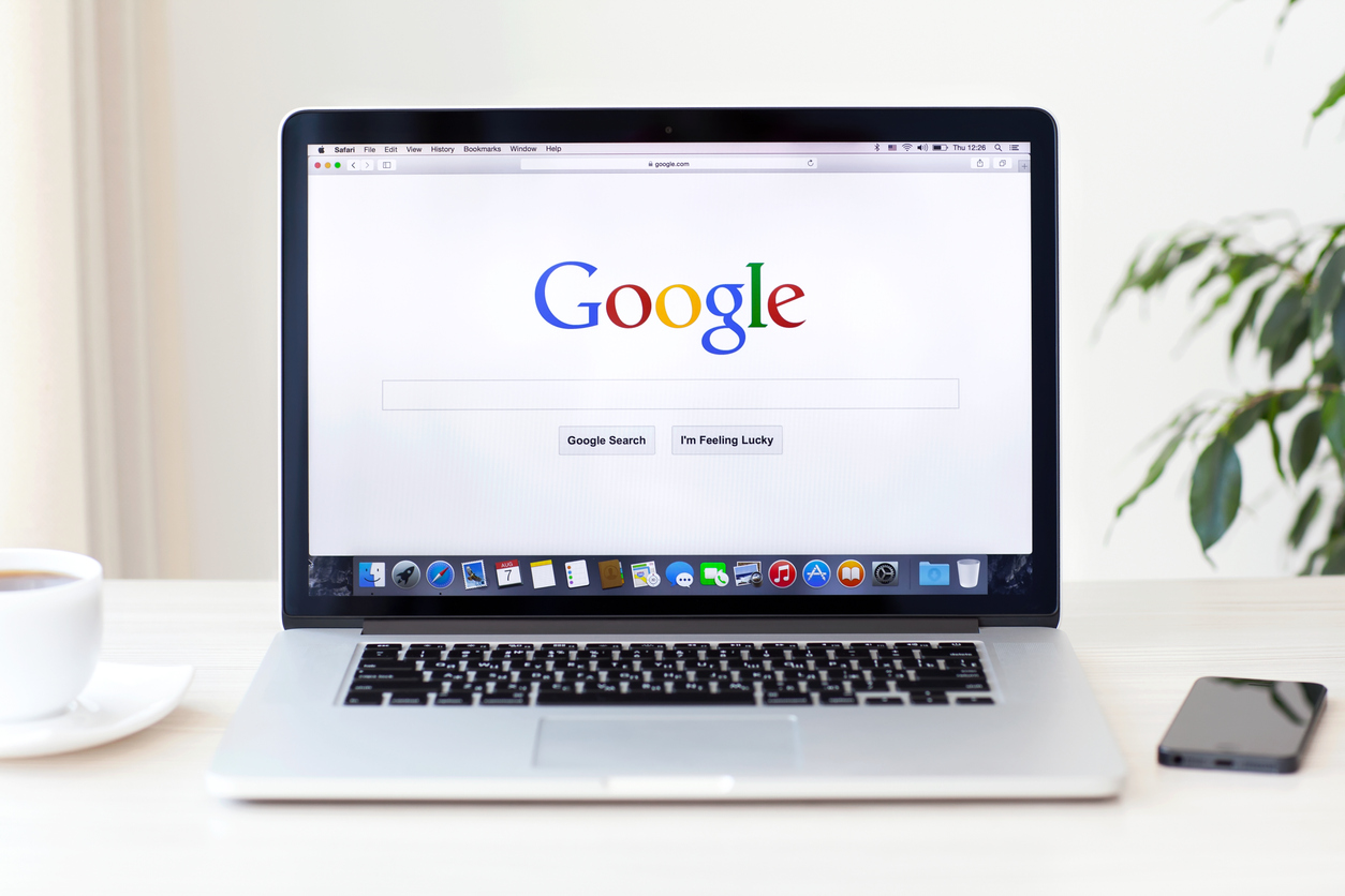 MacBook Pro Retina with Google home page on the screen