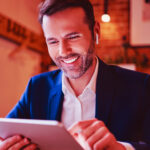 Man looking at tablet