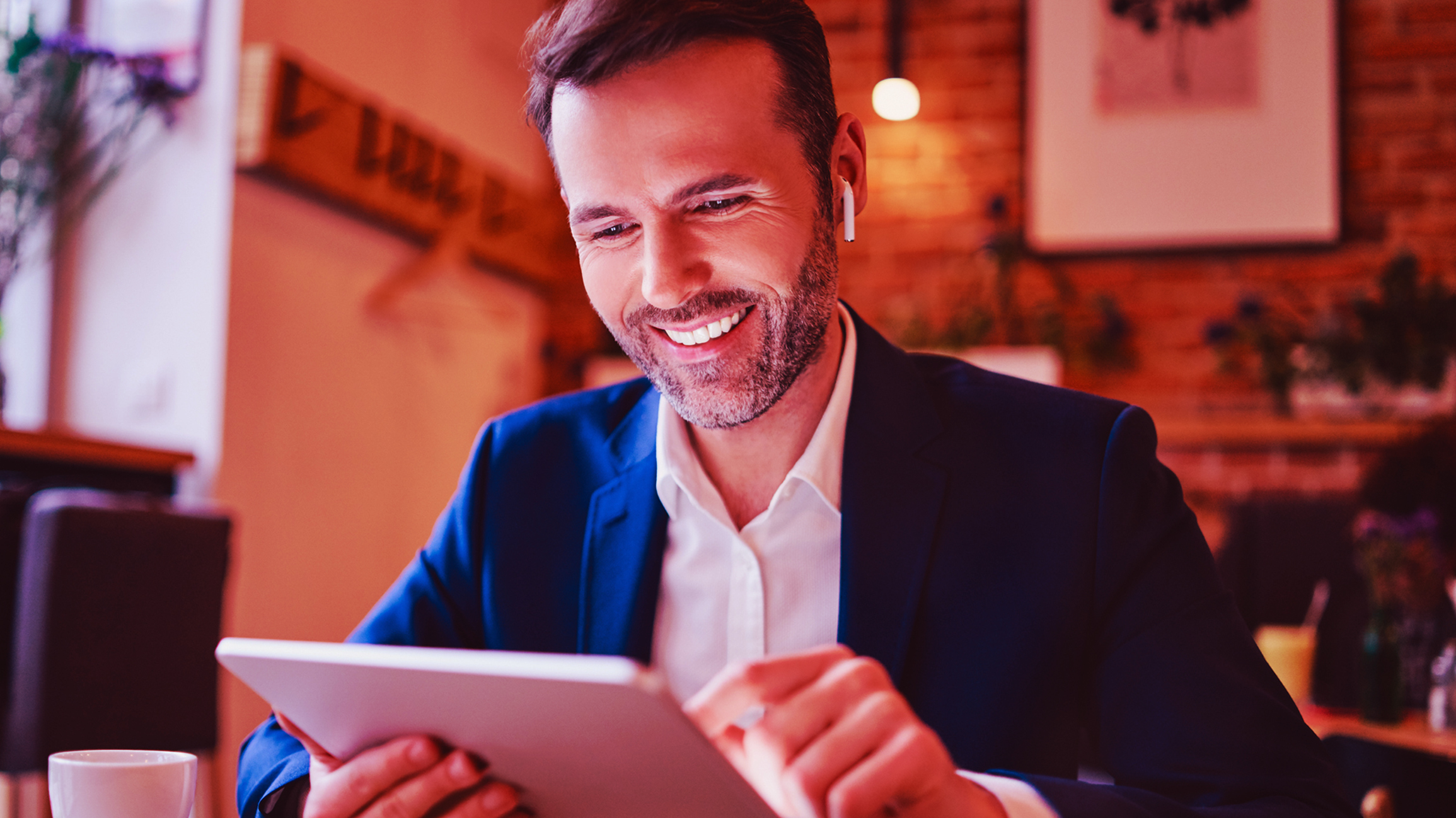 Man looking at tablet